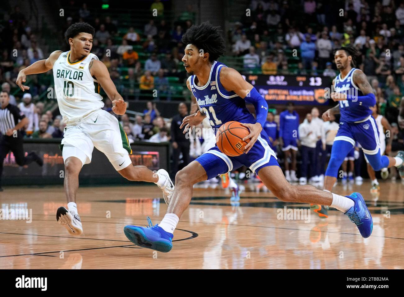 seton-hall-guard-isaiah-coleman-21-drives-to-the-basket-as-baylor-guard-rayj-dennis-10-defends-in-the-first-half-of-an-ncaa-college-basketball-game-in-waco-texas-tuesday-dec-5-2023-ap-phototony-gutierrez-2TBB2MA.jpg